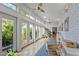 Bright playroom with French doors, hardwood floors, and built-in shelving at 1021 Dimmocks Mill Rd, Hillsborough, NC 27278