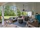 Relaxing back patio with seating area, fire pit, and outdoor kitchen at 1021 Dimmocks Mill Rd, Hillsborough, NC 27278