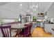 Modern kitchen with island, stainless steel appliances, and open shelving at 1021 Dimmocks Mill Rd, Hillsborough, NC 27278