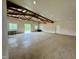 Large open space with exposed beams and access to outdoors at 1021 Dimmocks Mill Rd, Hillsborough, NC 27278