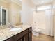 Bathroom with shower/tub combo and granite vanity at 1207 Brookview Dr, Elon, NC 27244