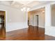 Open dining room with views into kitchen and hallway at 1207 Brookview Dr, Elon, NC 27244