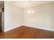 Simple dining area with hardwood floors and access to rear deck at 1207 Brookview Dr, Elon, NC 27244