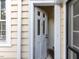 Open white door to a house entrance at 1208 College Pl, Raleigh, NC 27605