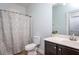 Clean bathroom with a shower/tub combo and dark wood vanity at 453 Granite Saddle Dr, Rolesville, NC 27571