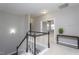 Upstairs hallway with view into bedroom and stairs at 453 Granite Saddle Dr, Rolesville, NC 27571