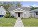 Charming house with a front porch and walkway at 204 W Hill St, Benson, NC 27504