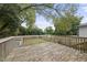 Wooden deck overlooking a fenced backyard with a shed at 204 W Hill St, Benson, NC 27504