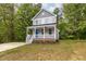 Two-story craftsman style home with front porch at 705 Jefferson St, Henderson, NC 27536