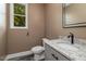 Bathroom with granite countertop and modern vanity at 705 Jefferson St, Henderson, NC 27536