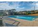 Community pool with a pool house and surrounding area at 532 Lena Cir, Chapel Hill, NC 27516