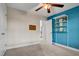Bedroom with ceiling fan, window, and built-in shelving at 532 Lena Cir, Chapel Hill, NC 27516