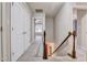 Upstairs hallway with carpet, stairs, and multiple doors at 532 Lena Cir, Chapel Hill, NC 27516
