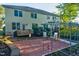 Spacious backyard with patio, raised garden beds, and deck at 532 Lena Cir, Chapel Hill, NC 27516