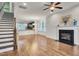 Hardwood floor living room with fireplace and view into kitchen area at 532 Lena Cir, Chapel Hill, NC 27516