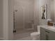 Spa-like bathroom with a walk-in shower and dual vanity at 2209 Paddstowe Main Way, Wake Forest, NC 27587