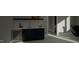 Modern wet bar with wine cooler and geometric tile backsplash at 2209 Paddstowe Main Way, Wake Forest, NC 27587