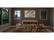 Bedroom with wood-paneled accent wall and a cozy bed at 2209 Paddstowe Main Way, Wake Forest, NC 27587