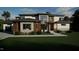 Modern two-story home with stone and siding exterior at 2209 Paddstowe Main Way, Wake Forest, NC 27587