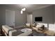Bright living room with ample seating and a mounted TV at 2209 Paddstowe Main Way, Wake Forest, NC 27587