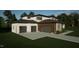 Modern two-story home with a three-car garage and landscaped yard at 2209 Paddstowe Main Way, Wake Forest, NC 27587