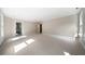 Bright and airy bedroom with plush carpet and plenty of natural light at 6300 Swallow Cove Ln, Raleigh, NC 27614