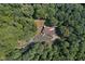 House with circular driveway and lush greenery at 6300 Swallow Cove Ln, Raleigh, NC 27614