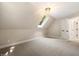 Bedroom with carpet flooring and a dormer window offering natural light at 6300 Swallow Cove Ln, Raleigh, NC 27614