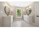 Double vanity bathroom with a modern design at 6300 Swallow Cove Ln, Raleigh, NC 27614