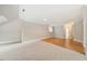 Bright bedroom with hardwood and carpeted floors and ample space at 6300 Swallow Cove Ln, Raleigh, NC 27614