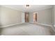 Spacious bedroom with carpet flooring and ensuite bathroom at 6300 Swallow Cove Ln, Raleigh, NC 27614