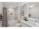 Modern bathroom with marble tile, a soaking tub and walk-in shower at 521 Nc-54, Durham, NC 27713