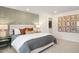 Main bedroom with a king-size bed and an accent wall at 219 Anise Ln, Garner, NC 27529