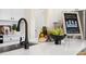 Kitchen island with modern sink and faucet fixtures at 219 Anise Ln, Garner, NC 27529