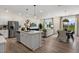 Open floor plan with kitchen island and living room view at 219 Anise Ln, Garner, NC 27529