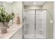 Clean bathroom with a shower and double vanity at 219 Anise Ln, Garner, NC 27529