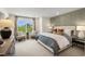 Spacious main bedroom with a large bed, sitting area, and natural light at 219 Anise Ln, Garner, NC 27529
