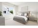 Bright bedroom with a plush bed and large window at 2408 Adrift Road, Fuquay Varina, NC 27526