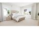 Spacious bedroom with a large bed and plenty of natural light at 2408 Adrift Road, Fuquay Varina, NC 27526