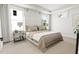 Bright bedroom with a large bed, neutral tones, and plenty of natural light at 2408 Adrift Road, Fuquay Varina, NC 27526