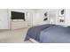 Main bedroom with a dresser and large bed, offering ample space at 2412 Adrift Road, Fuquay Varina, NC 27526