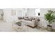 Bright living room featuring a comfortable sectional sofa and stylish coffee table at 2412 Adrift Road, Fuquay Varina, NC 27526