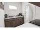 Well-lit laundry room with cabinets and counter space at 2412 Adrift Road, Fuquay Varina, NC 27526