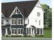 Modern farmhouse style townhome with dark gray and white exterior at 3018 White Rail Dr, Fuquay Varina, NC 27526