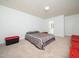 Bright bedroom with carpeted floor and ample closet space at 4621 Easthampton Dr, Raleigh, NC 27604