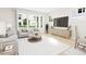 Spacious living room with large windows and ample natural light at 2404 Adrift Rd, Fuquay Varina, NC 27526
