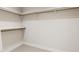 Walk-in closet with hanging rods and shelving at 2404 Adrift Rd, Fuquay Varina, NC 27526