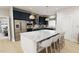 Modern kitchen with island, stainless steel appliances, and blue cabinets at 2404 Adrift Rd, Fuquay Varina, NC 27526