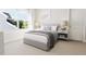 Cozy bedroom featuring a comfortable bed and large window at 2404 Adrift Rd, Fuquay Varina, NC 27526