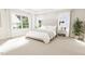 Spacious bedroom with large window and upholstered headboard at 2404 Adrift Rd, Fuquay Varina, NC 27526